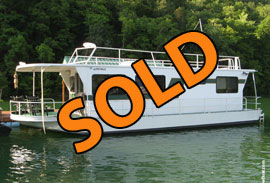1984 SkipperLiner 14 x 50 Steel Hull Houseboat with Dock and Pontoon Boat For Sale on Norris Lake TN