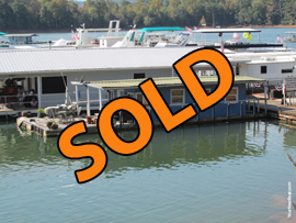 364sqft Floating Cabin Reconstruction Project For Sale on Norris Lake with a transferable slip connected to shore via a marina walkway at Sequoyah Marina